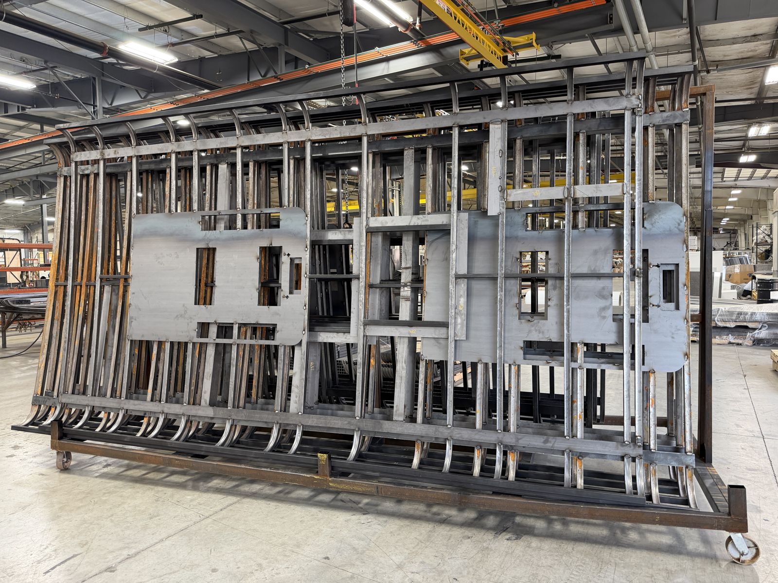 HLE shuttle bus steel cage structure on the factory floor in Wakarusa, Indiana