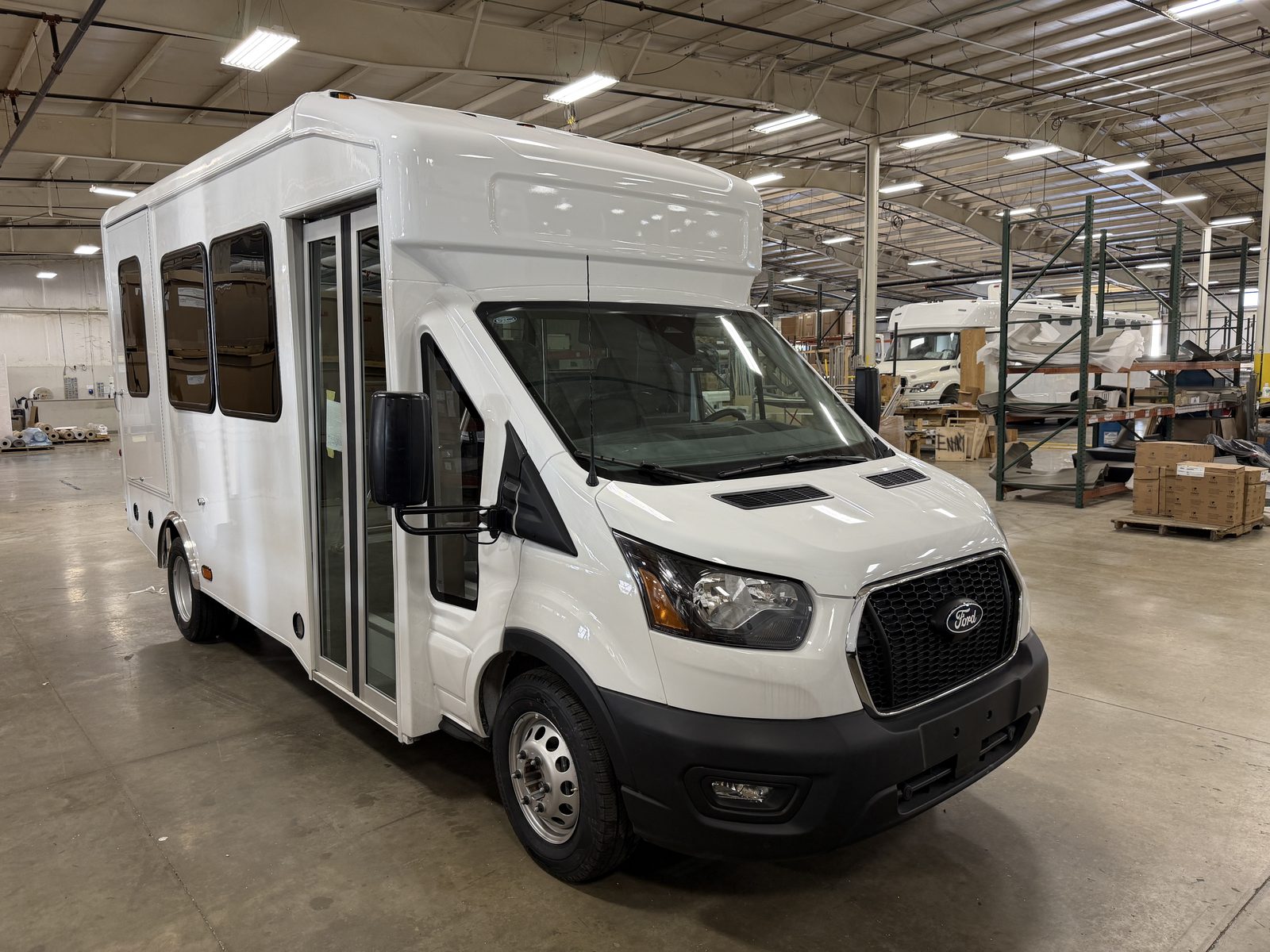 STRYKR shuttle bus, front three-quarter passenger side